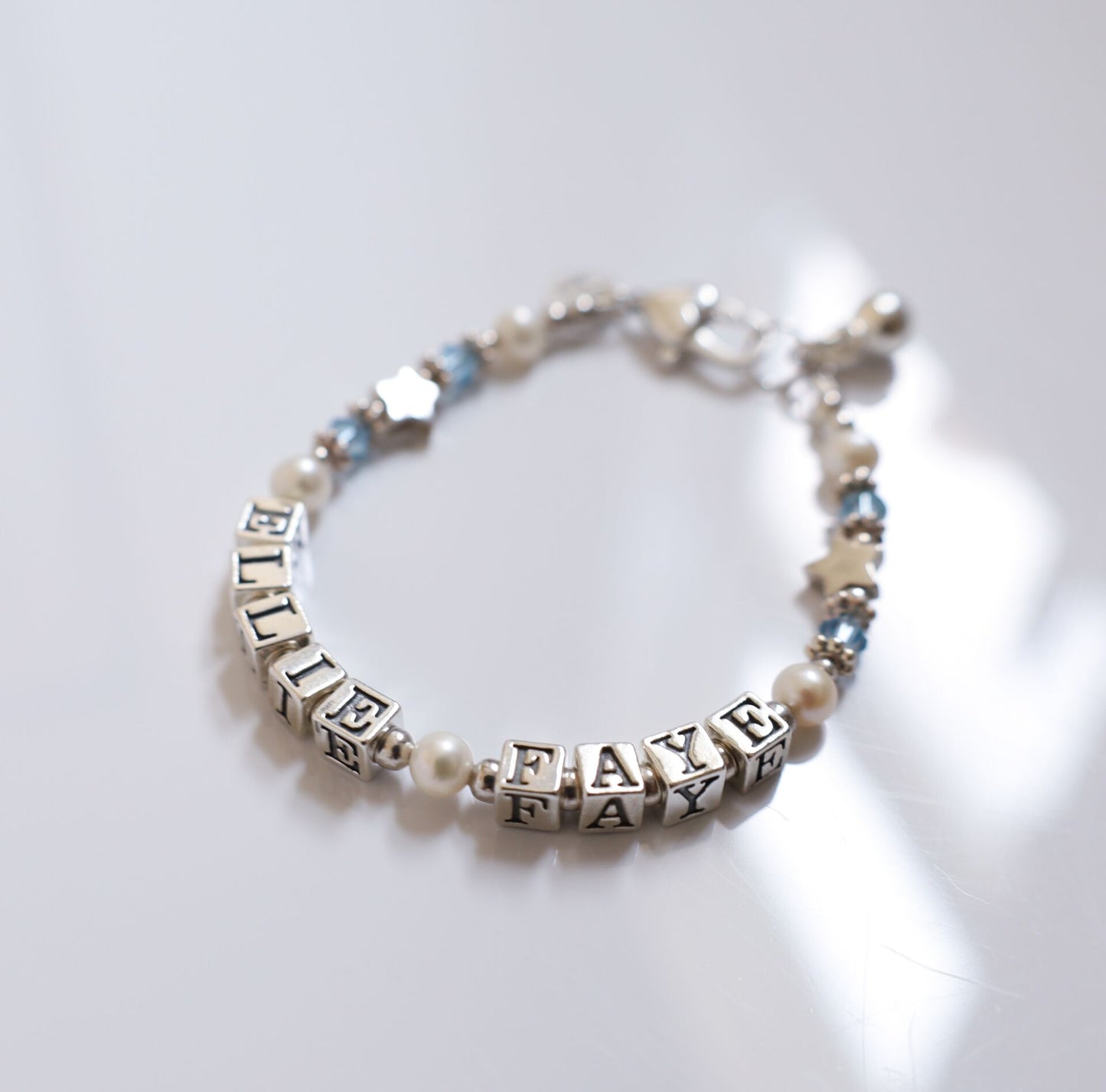 GREATNESS BIRTHSTONE NAME BRACELET