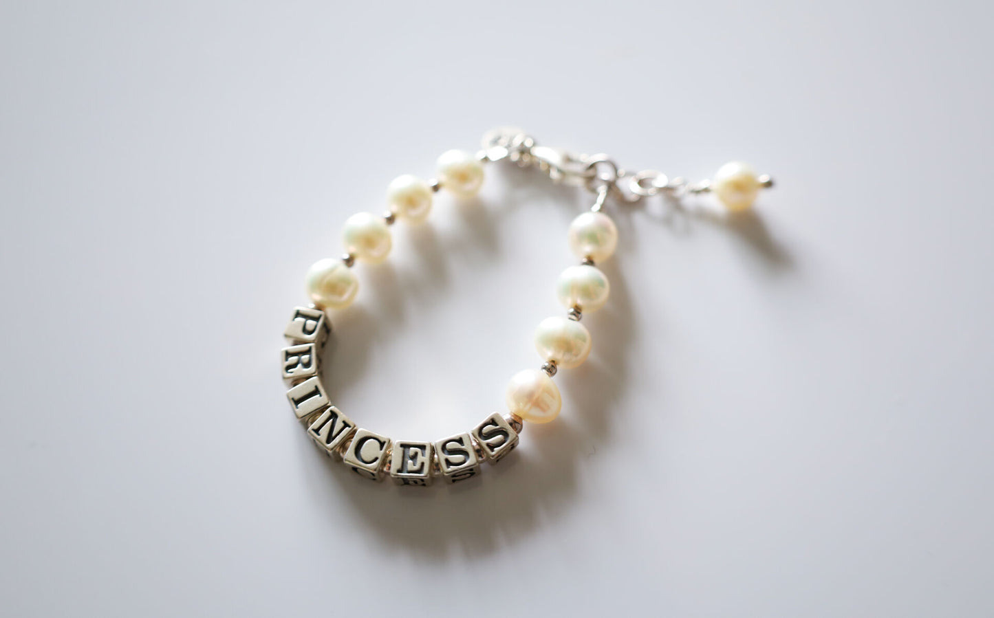FIRST PEARLS NAME GIRLS BRACELET (LARGE PEARLS)