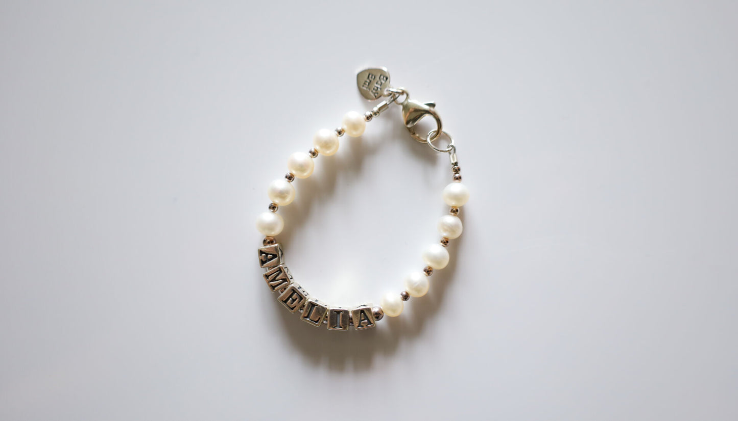 FIRST PEARLS NAME GIRLS BRACELET (SMALL PEARLS)